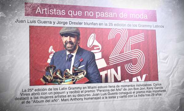 Un periódico con la imagen de Juan Luis Guerra, posando con varios premios Grammy en la 25ª gala de los Grammy Latinos, y el titular "artistas que no pasan de moda"