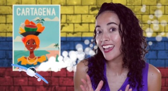 A Colombian girls with a background with a poster of Cartagena